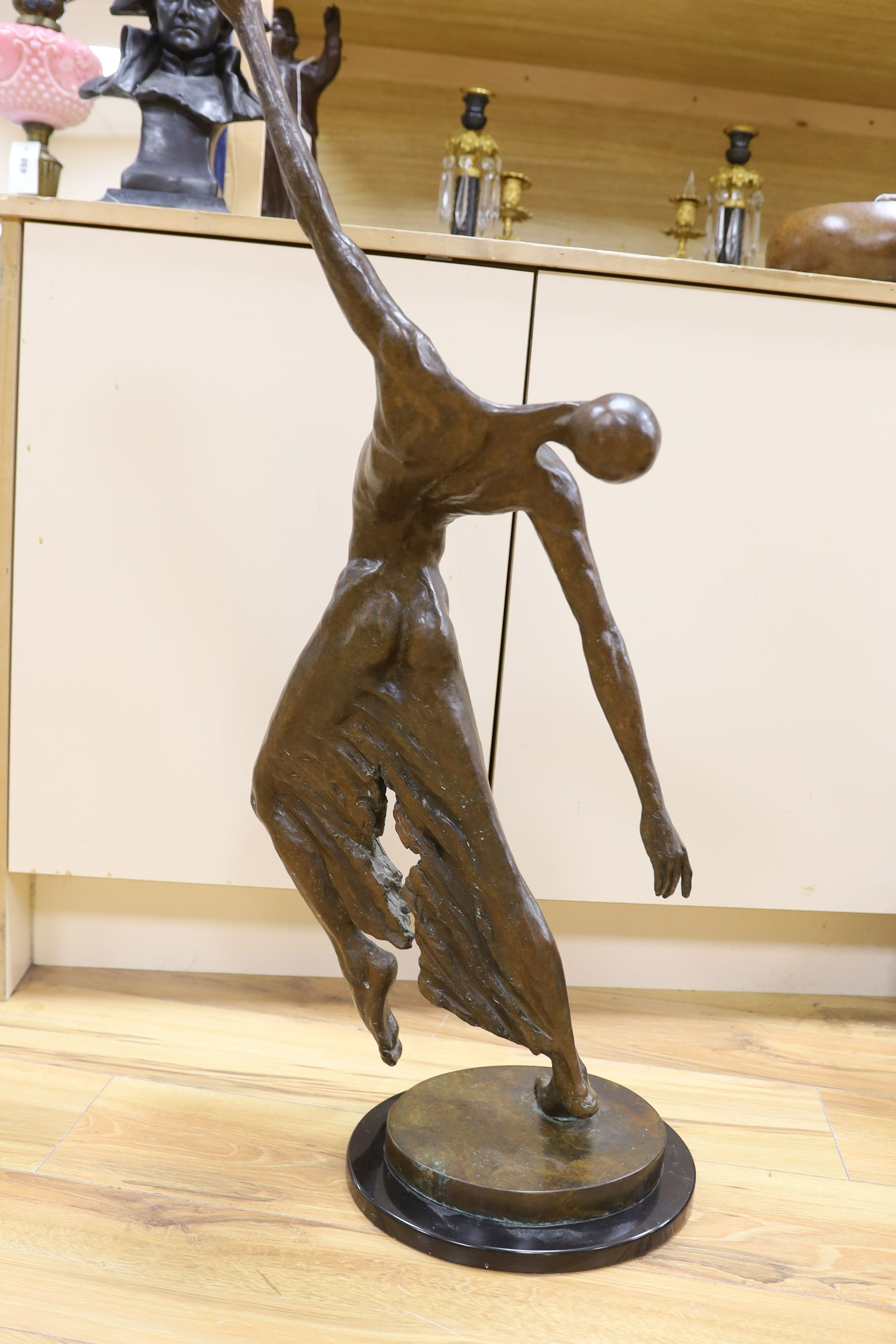 A large modern bronze of a male dancer, unsigned